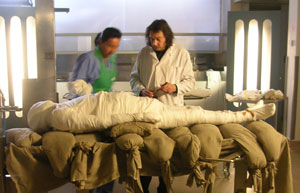 Stephen Buckley mummifying Alan